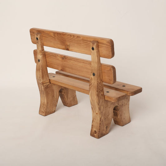 Adorable wooden garden bench baby prop, designed for newborn and toddler photoshoots. Features a rustic charm with a natural wood finish, perfect for outdoor or garden-themed photography sessions.