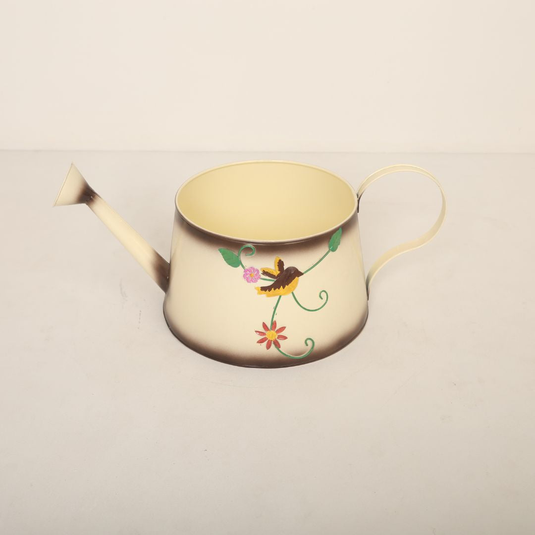 A garden sprinkler baby photoshoot prop, styled outdoors with floral decor, creating a whimsical theme for baby photography sessions.