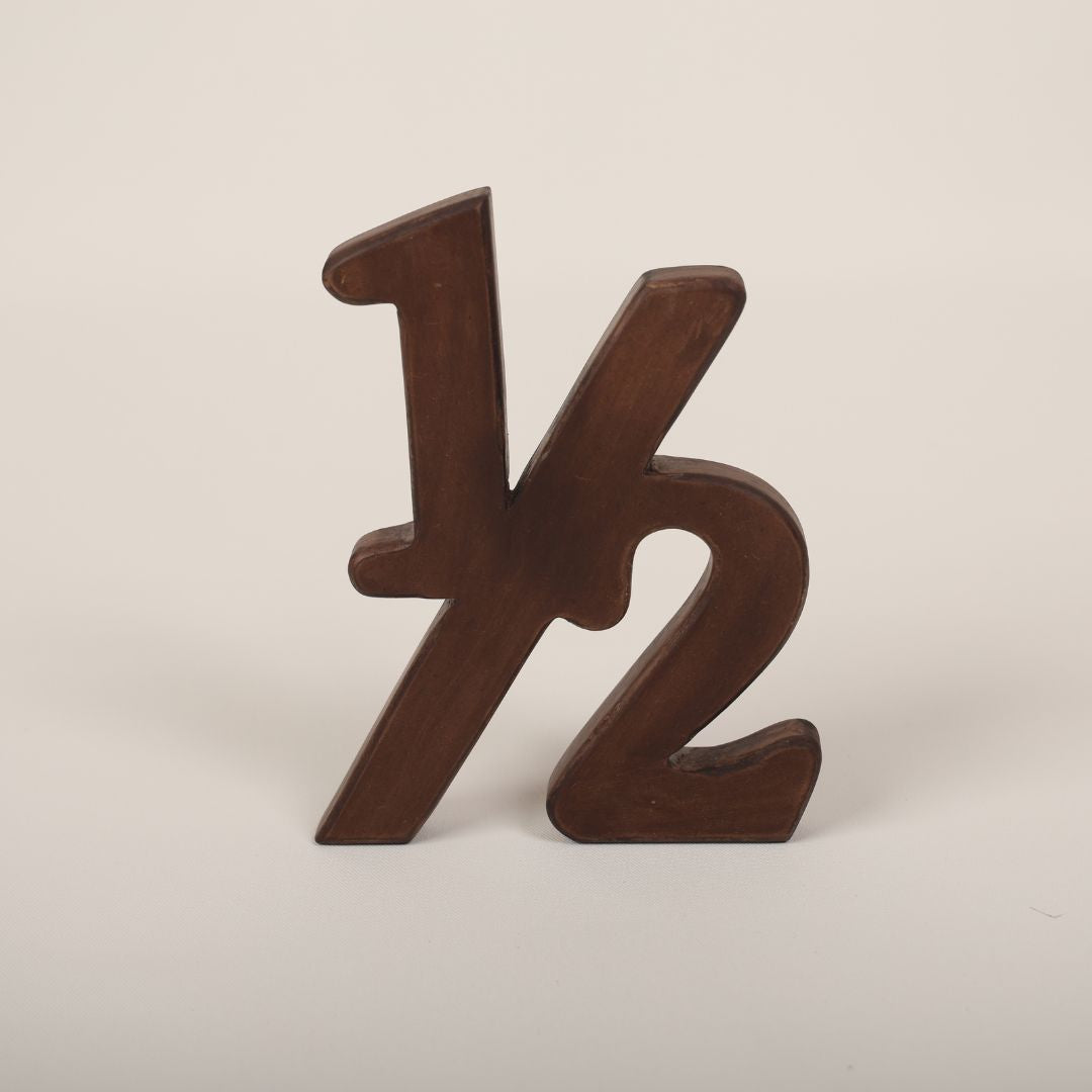 Adorable Half Birthday Prop showcasing '½' for six-month baby milestone photoshoots.