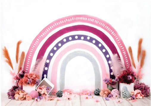 Arch-shaped rainbow baby photoshoot background with soft pastel hues, creating a magical and cheerful setting for adorable baby portraits.