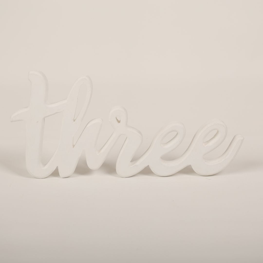 Bright and cheerful Three Birthday Prop featuring a 'three' for third-year photography setups