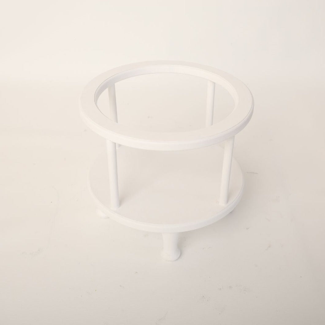 This is a low height round shaped cradle for sitter baby for baby photoshoot sessions.