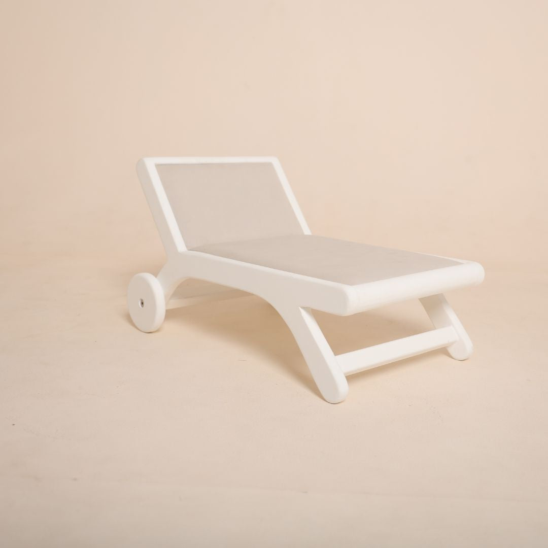 Wooden beach side bench baby photoshoot prop for seaside or summer photography theme setup.