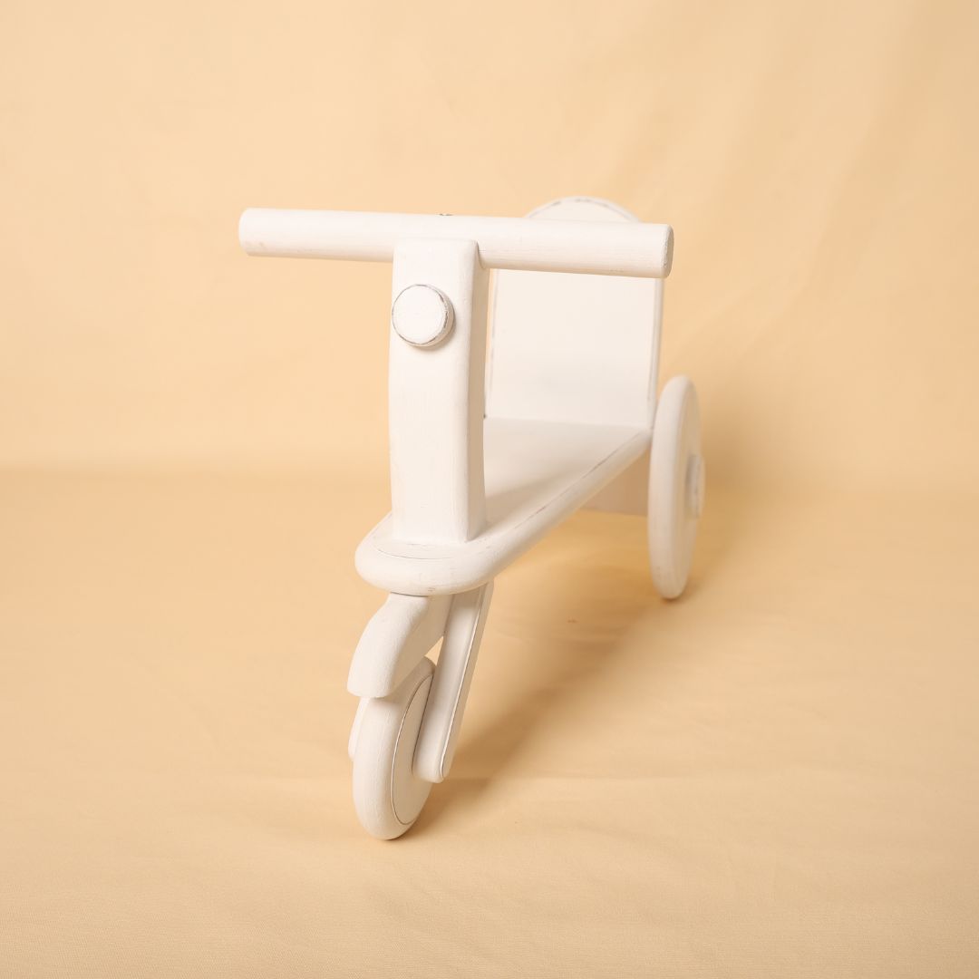 Cycle baby prop for baby photoshoot, handcrafted wooden design perfect for toddler and sitter milestone photography setups, available at baby prop store.