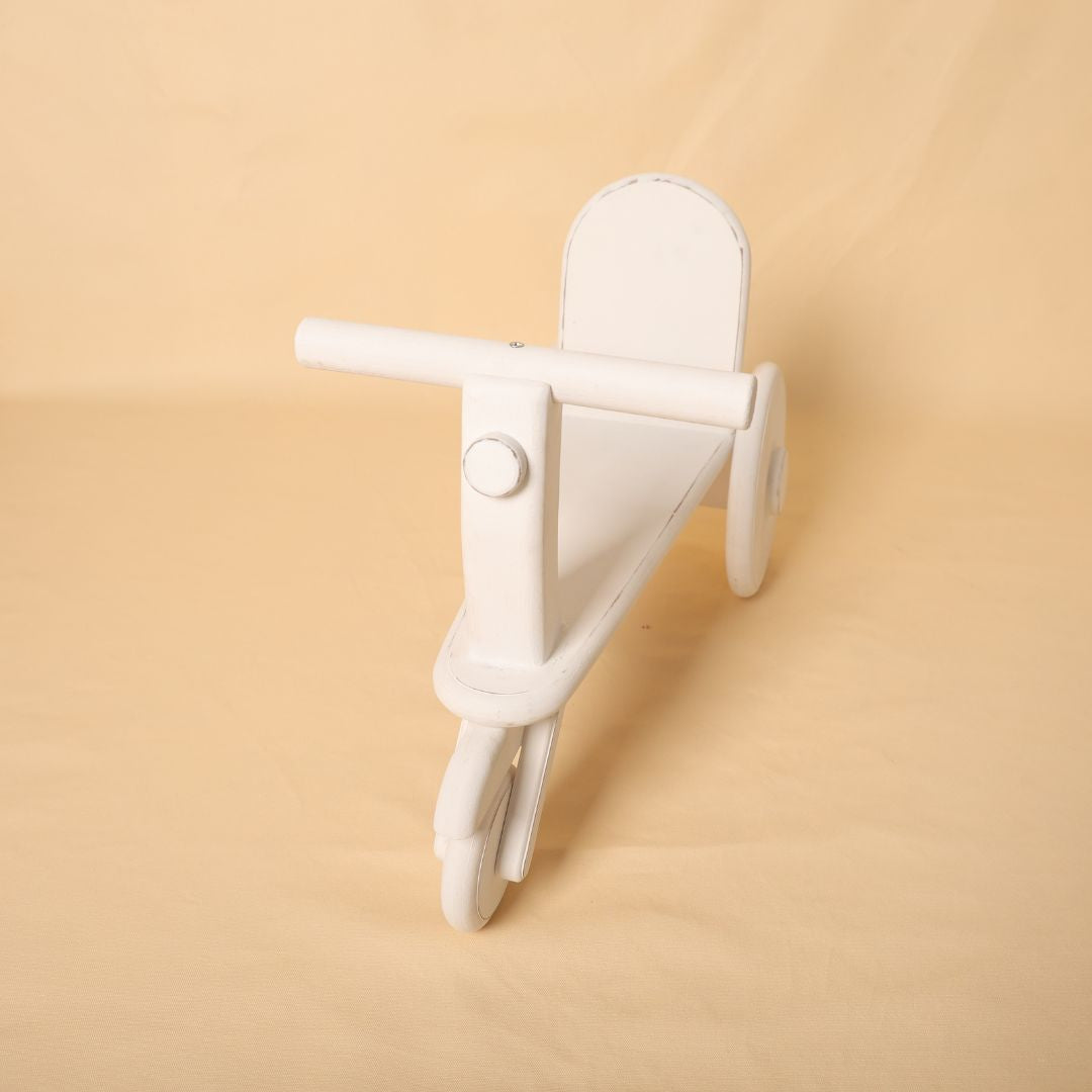 Cycle baby prop for baby photoshoot, handcrafted wooden design perfect for toddler and sitter milestone photography setups, available at baby prop store.