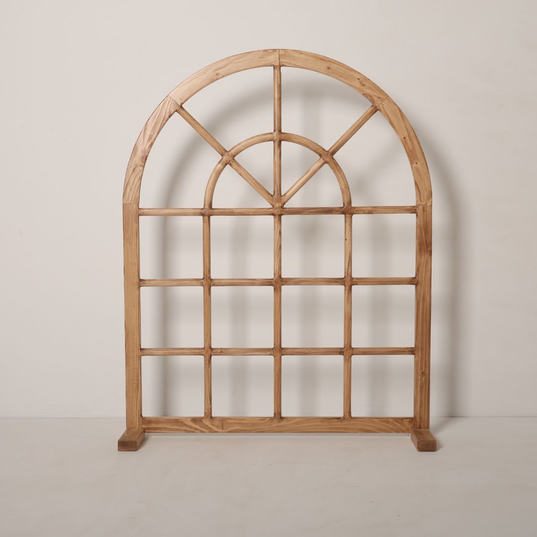 A beautifully crafted wooden arch frame prop, designed for baby and maternity photoshoots. Perfect for creating dreamy and elegant setups with its smooth curves and natural finish.