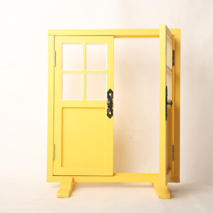 A vibrant yellow door prop designed for baby photoshoots, standing upright with a playful charm. The bright color adds warmth and cheer, making it an ideal backdrop for capturing adorable moments with newborns and toddlers.