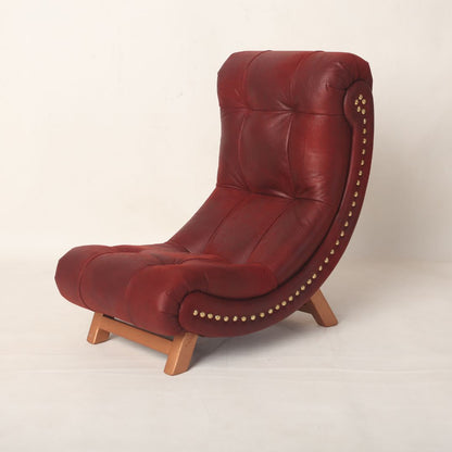 Crescent moon-shaped baby photography prop with a soft cushioned seat, designed in a light pastel color. Ideal for baby photoshoots, the prop is styled to create a dreamy, celestial-themed setting.