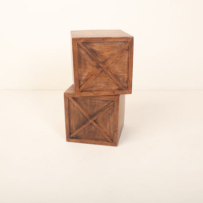 Two charming boxes placed on either side of a door prop, perfect for adding balance and visual interest to newborn photography setups.