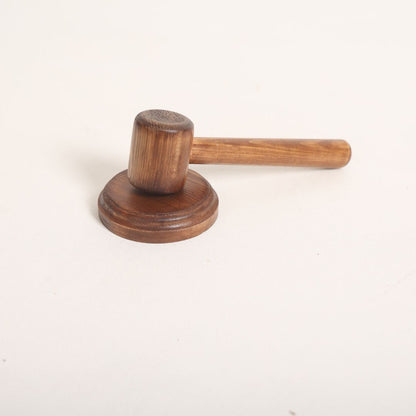 A set of courtroom-themed baby props, including a miniature judge's chair, a judge's table, a witness stand, and a tiny gavel. The props are designed for baby photoshoots, showcasing playful details and realistic features that create an engaging scene for photographers.