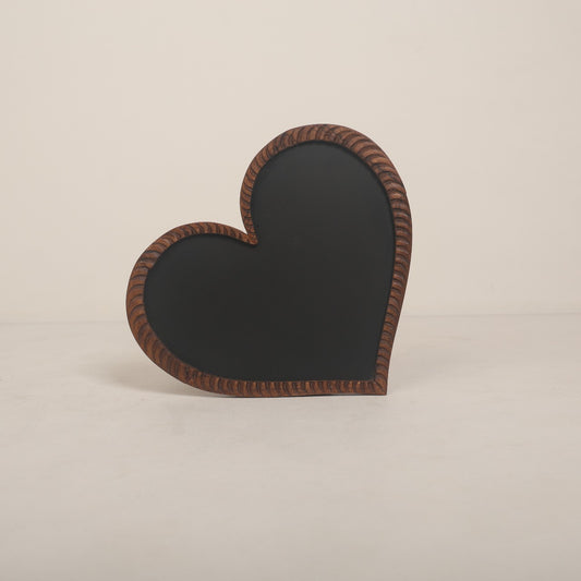 Heart-shaped wooden signage prop for maternity photography, featuring customizable messages like 'It's a Boy,' 'It's a Girl,' or 'Promoted to Big Brother/Sister.