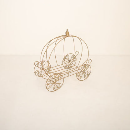 Golden metal carriage baby photoshoot prop with intricate design, perfect for fairytale and princess-themed photography.