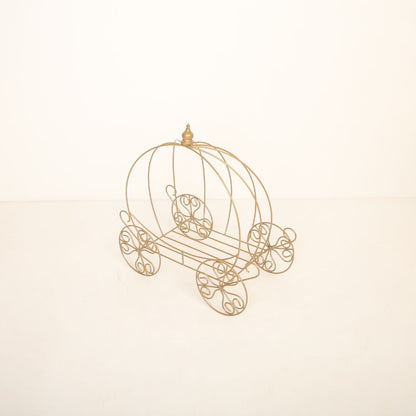 Golden metal carriage baby photoshoot prop with intricate design, perfect for fairytale and princess-themed photography.