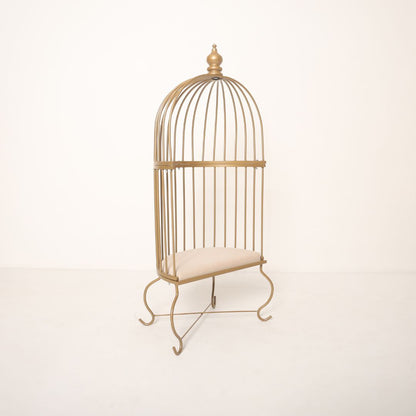 Metal cage prop for toddler baby photoshoot with elegant design, perfect for milestone and themed photography sessions.