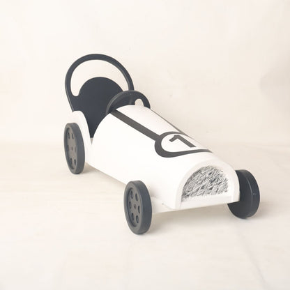 This is a racing car baby prop for baby photoshoot.