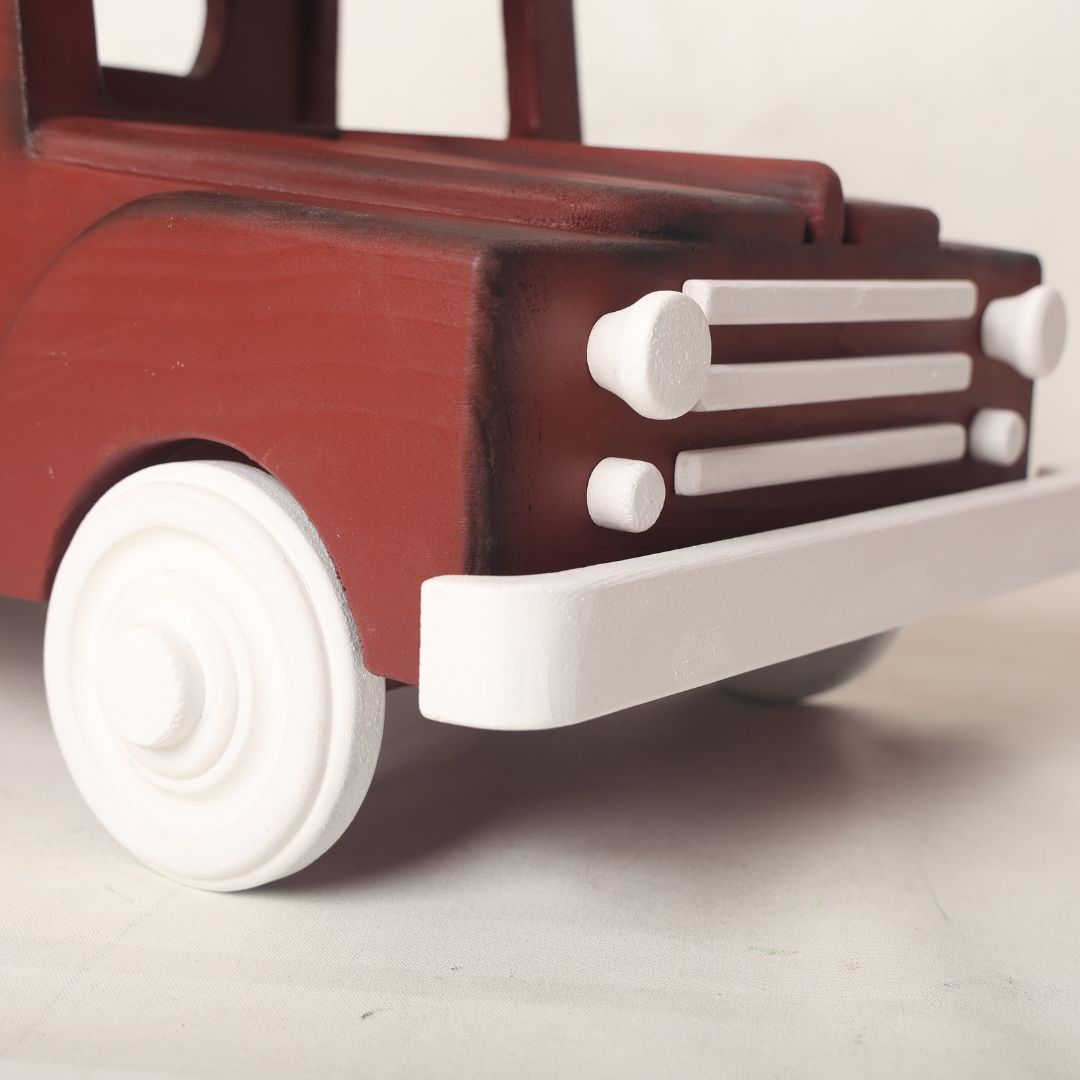  wooden truck baby prop designed for baby photoshoots. The truck features a vintage-inspired design with detailed wheels, a spacious cargo area, and a distressed finish. Perfect for creating adorable and unique photography setups for newborns and toddlers.