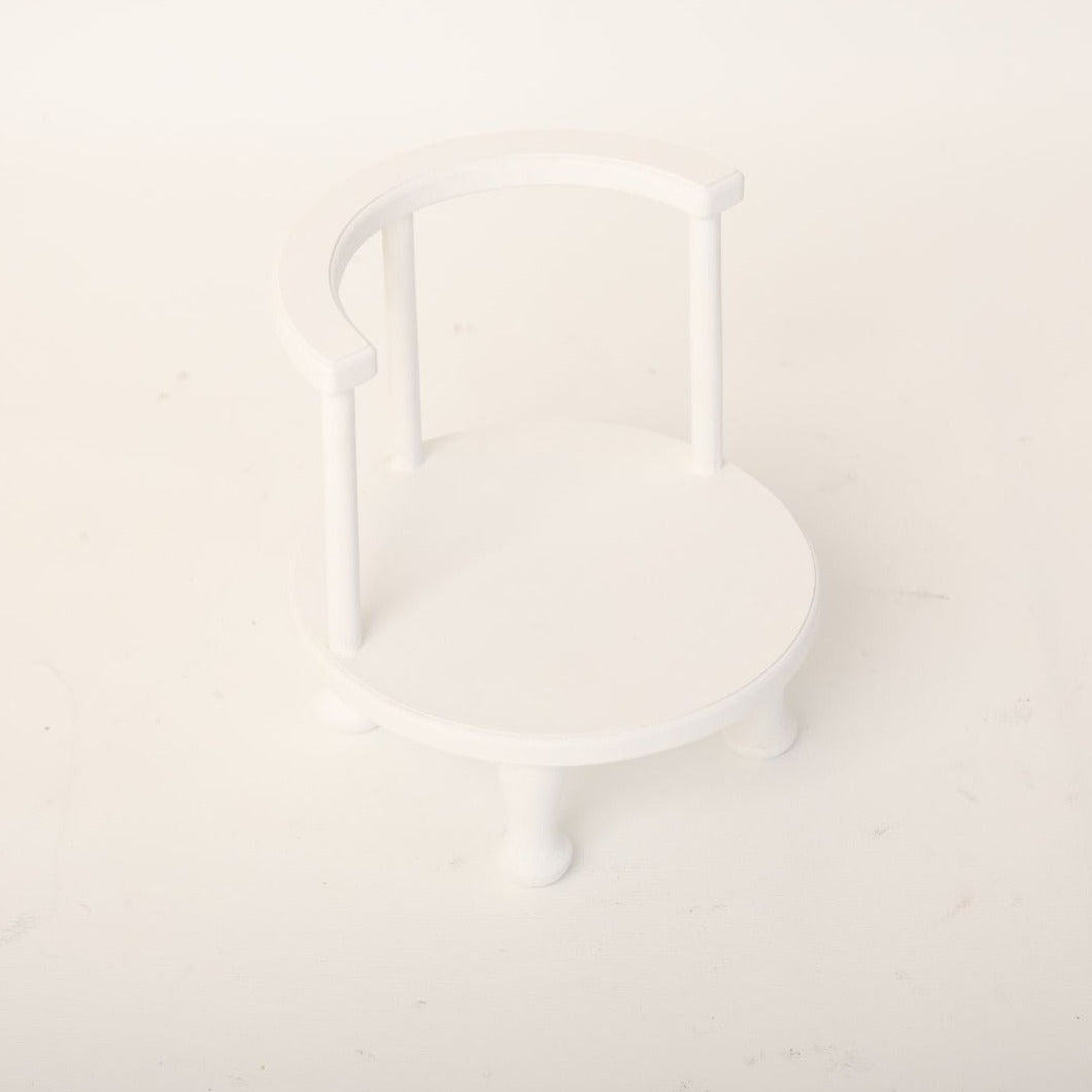 This is a low chair baby prop for baby photoshoot.