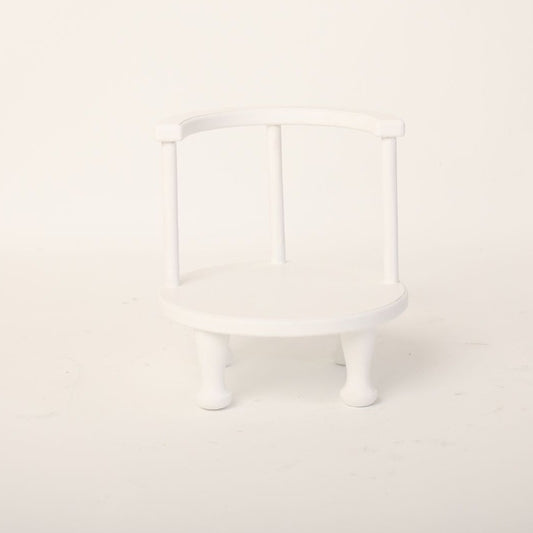 This is a low chair baby prop for baby photoshoot.