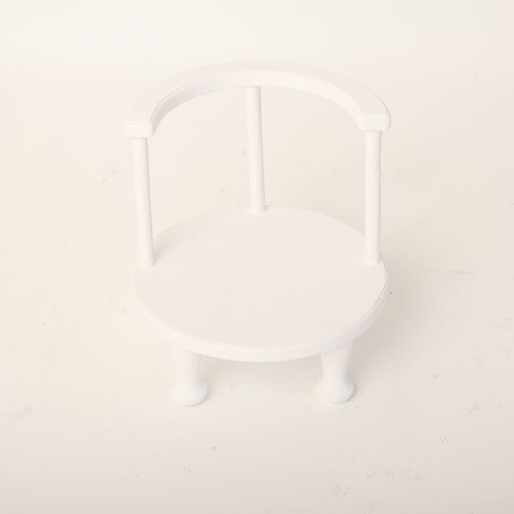 This is a low chair baby prop for baby photoshoot.