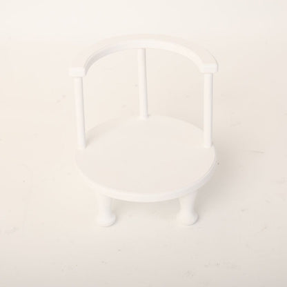 This is a low chair baby prop for baby photoshoot.