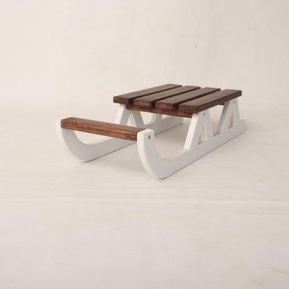 This is a Christmas sledge baby prop for photoshoot.
