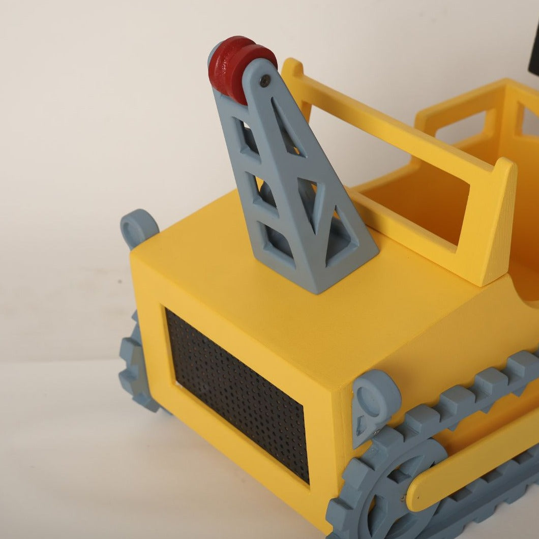 construction-themed crane baby prop, capturing tender moments of innocence and joy.