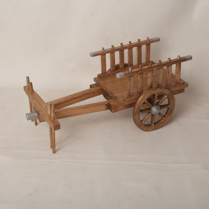 Traditional bullock cart baby prop designed for photoshoots, featuring a rustic design perfect for newborn and toddler photography sessions.