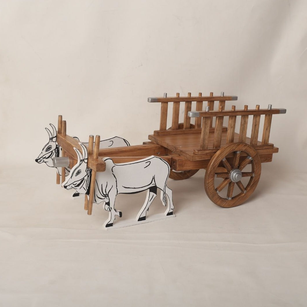 Traditional bullock cart baby prop designed for photoshoots, featuring a rustic design perfect for newborn and toddler photography sessions.