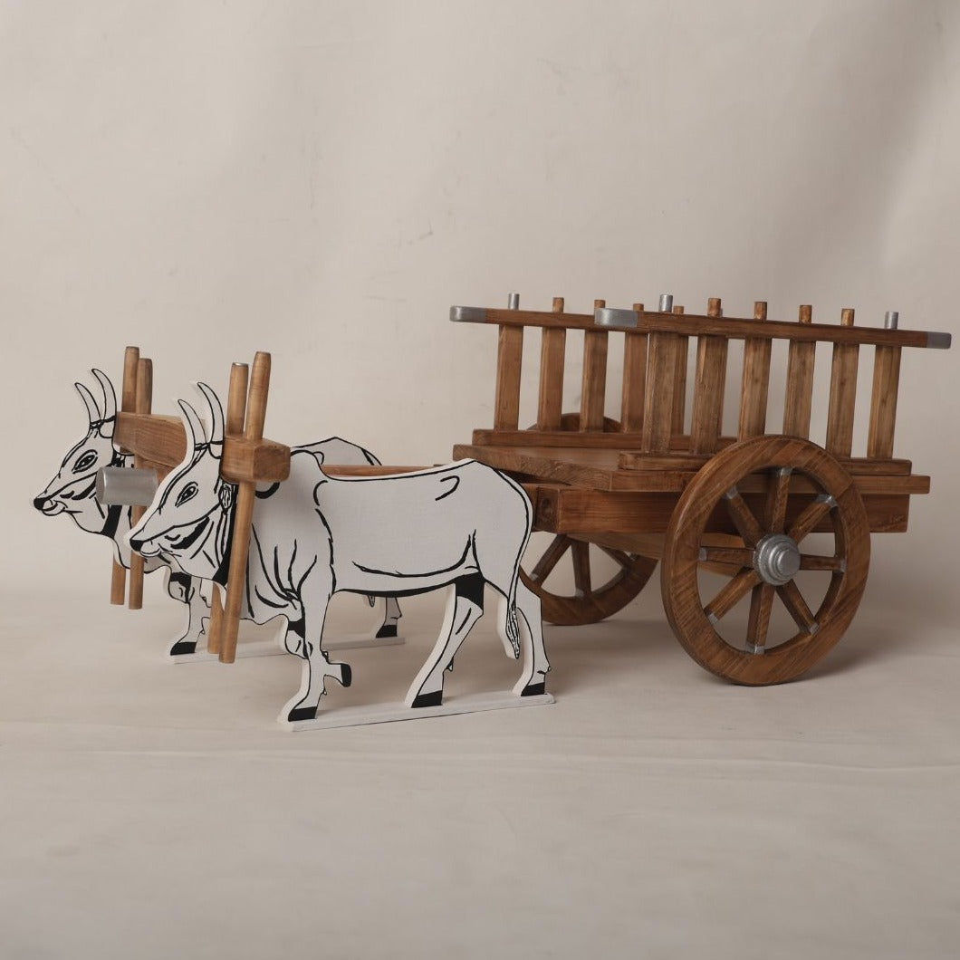 Traditional bullock cart baby prop designed for photoshoots, featuring a rustic design perfect for newborn and toddler photography sessions.