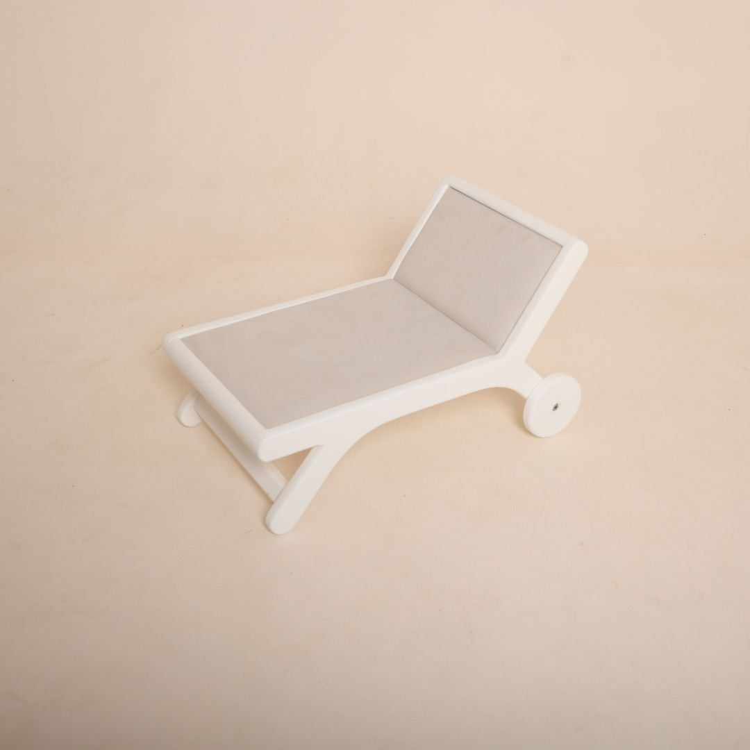 Wooden beach side bench baby photoshoot prop for seaside or summer photography theme setup.