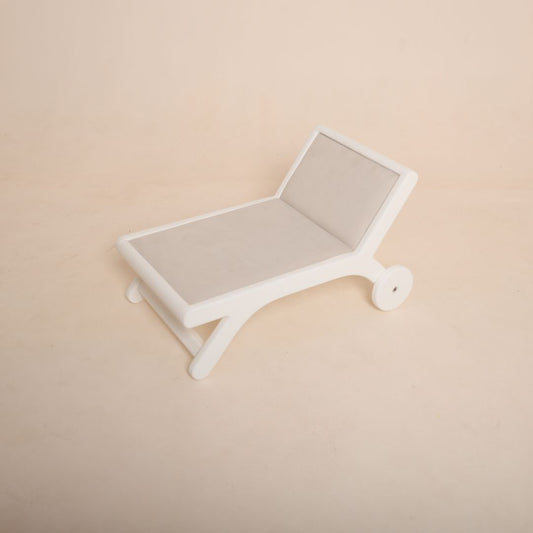 Wooden beach side bench baby photoshoot prop for seaside or summer photography theme setup.