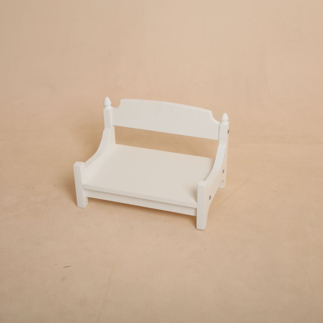 Close up of wooden bench baby prop showing smooth finish and premium craftsmanship