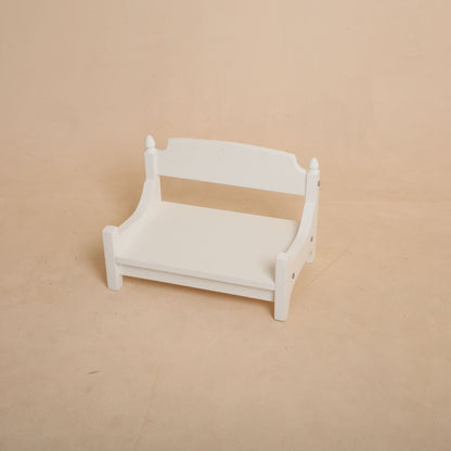 Close up of wooden bench baby prop showing smooth finish and premium craftsmanship