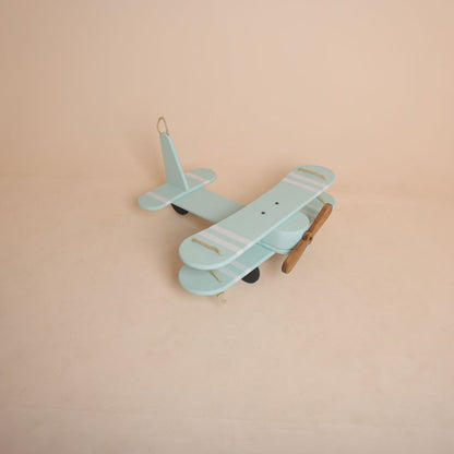 Biplane baby photoshoot prop used in newborn and milestone photography.