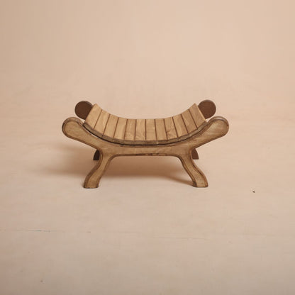 Brown wooden bench baby photoshoot prop with baby posing