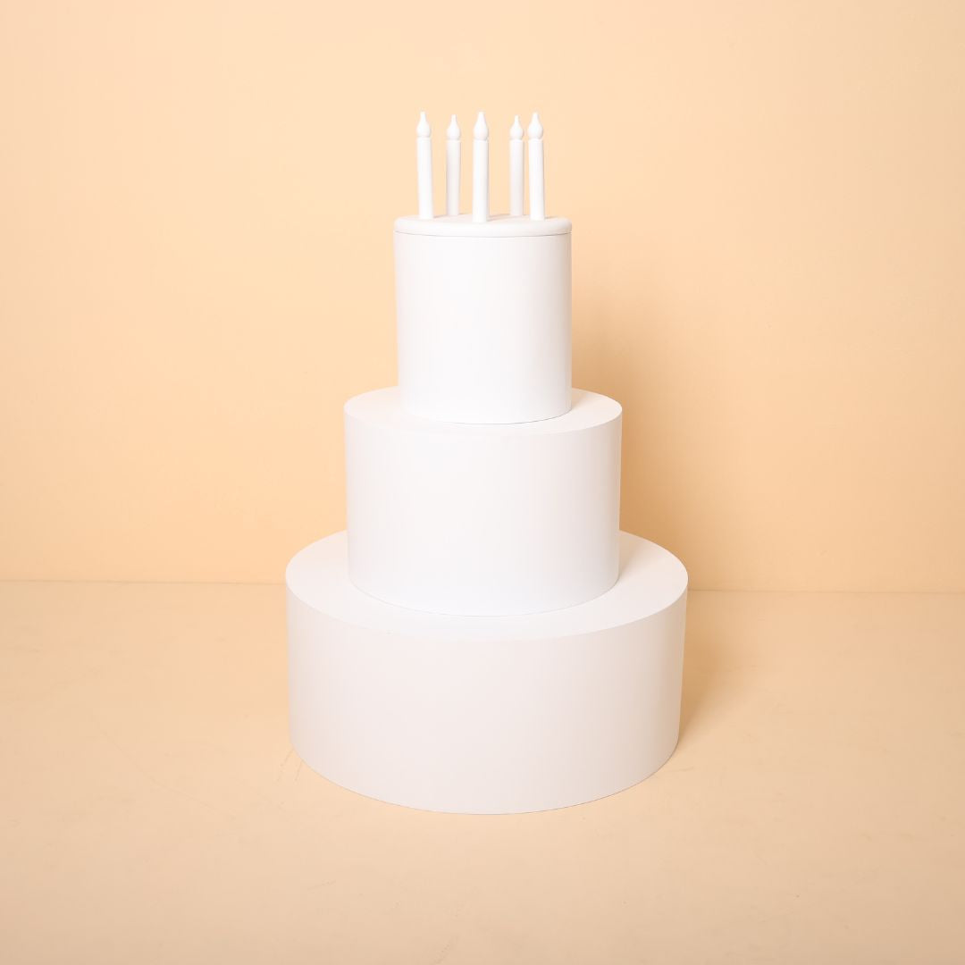 Large three-layer cake baby prop for milestone and birthday photoshoots, perfect photography setup