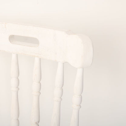 A stylish chair prop, ideal for photoshoots, featuring a classic design and neutral color scheme. The chair adds elegance and sophistication to any scene, making it a perfect accessory for professional photography sessions.