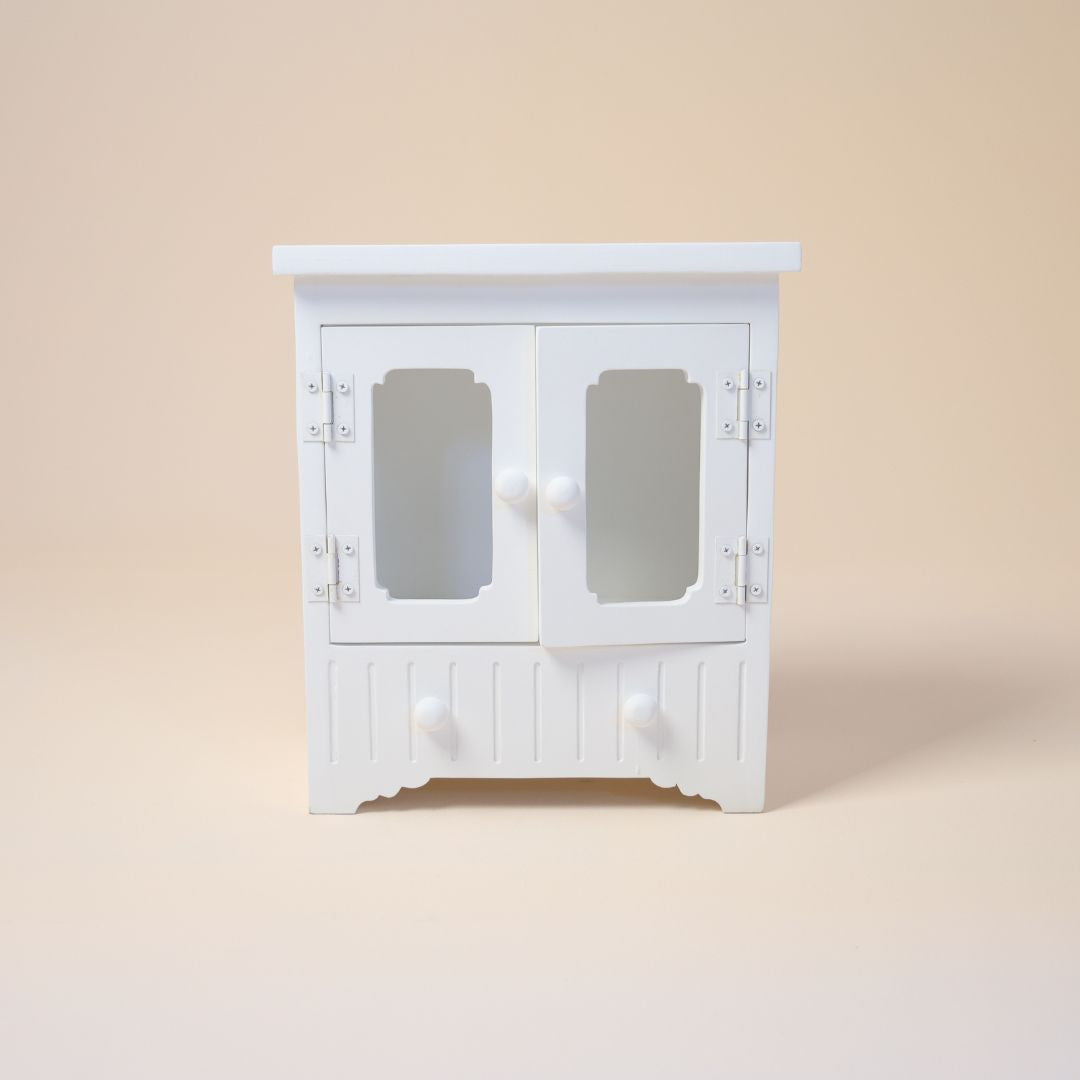 White wooden almirah baby photoshoot prop with closed doors for studio newborn and sitter shoot