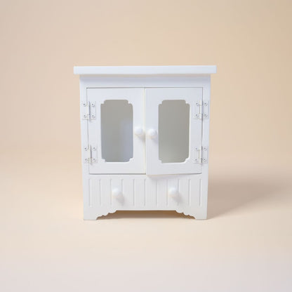 White wooden almirah baby photoshoot prop with closed doors for studio newborn and sitter shoot