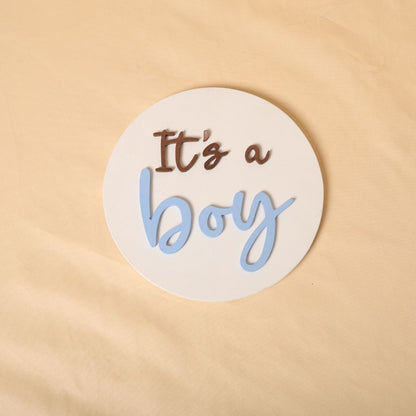 Gender reveal prop for maternity photoshoot featuring 'It's a Boy' and 'It's a Girl' signs, perfect for expecting mothers