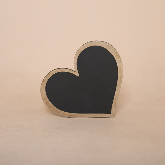 Heart shaped announcement board for maternity photoshoot and pregnancy reveal