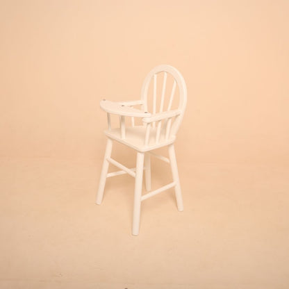 Premium wooden high chair baby photoshoot prop styled in a studio setup, designed for newborn and sitter milestone portraits, cake smash sessions and baby photography.