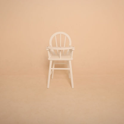 Premium wooden high chair baby photoshoot prop styled in a studio setup, designed for newborn and sitter milestone portraits, cake smash sessions and baby photography.