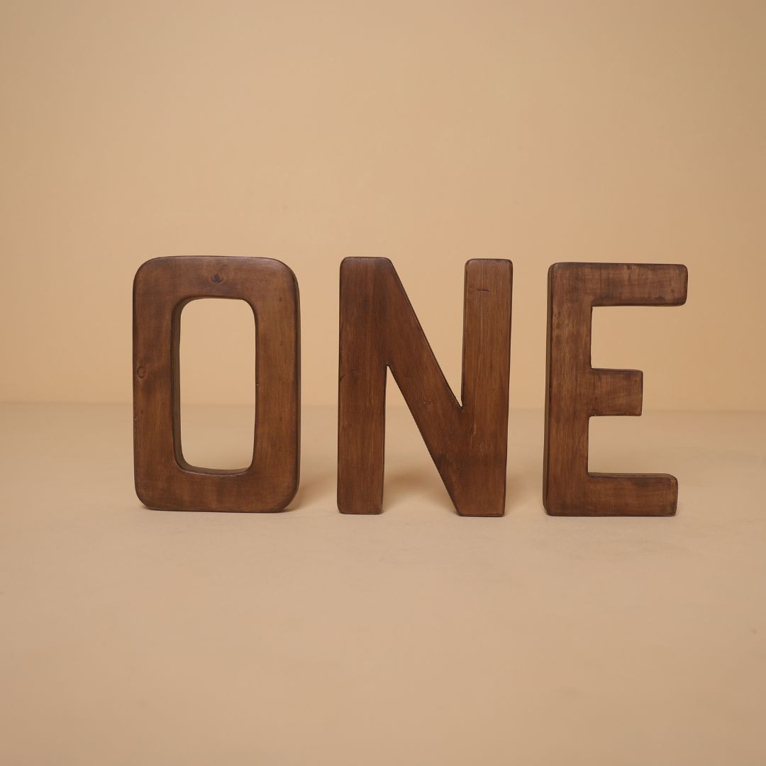 “O N E” wooden milestone prop for 1st birthday baby photoshoot setup – pre-birthday decoration