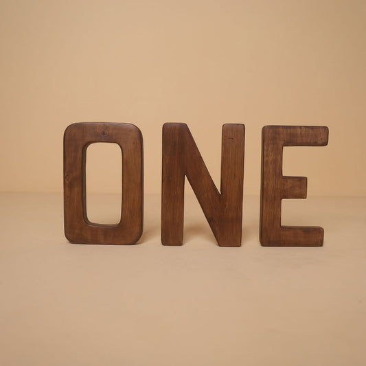 “O N E” wooden milestone prop for 1st birthday baby photoshoot setup – pre-birthday decoration