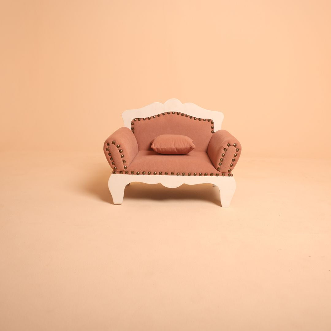 Pink royal sofa baby prop for newborn and sitter photoshoots.