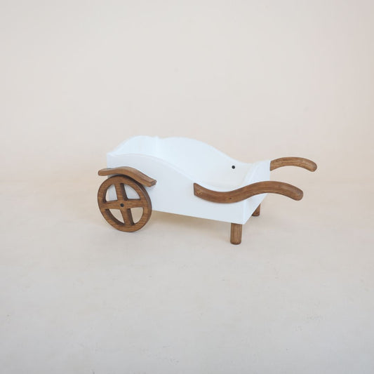 Pull cart baby photoshoot prop used for newborn and milestone photography.