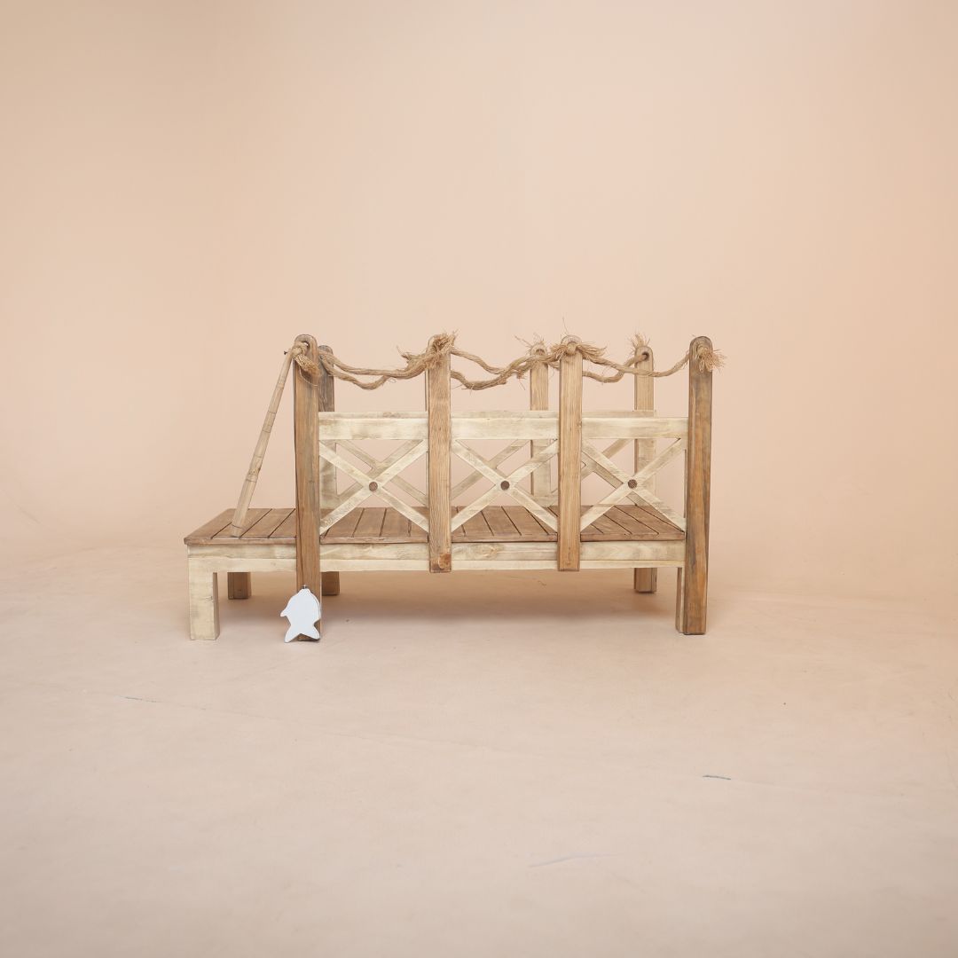 Riverside deck prop for baby photoshoot with fishing theme, ideal for outdoor photography near water bodies