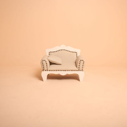 Elegant ivory white baby posing sofa for professional photography.