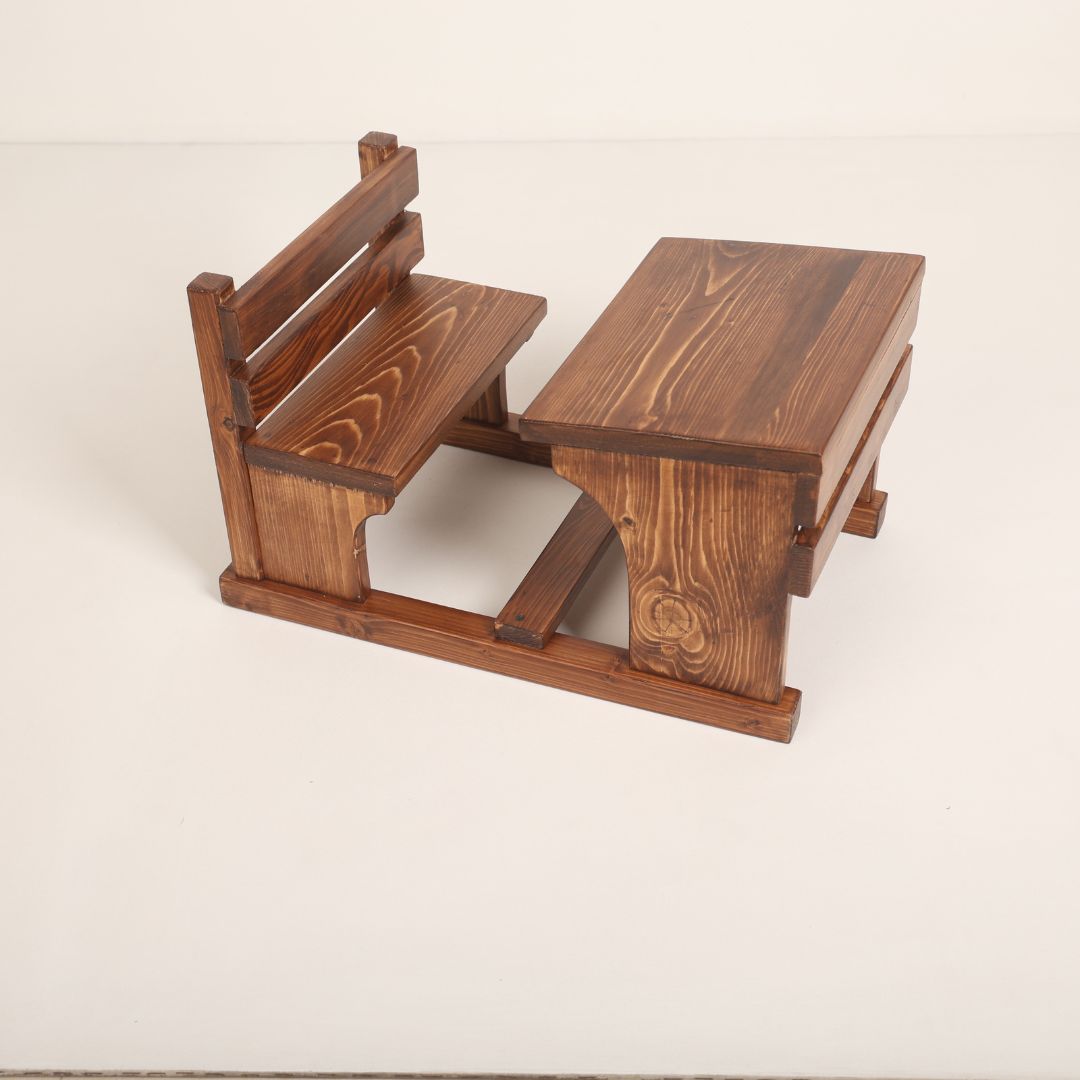 Wooden school desk baby prop, perfect for vintage classroom-themed photoshoots, featuring a rustic design and natural wood finish.